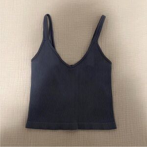 blue ripped tank top from a boutique